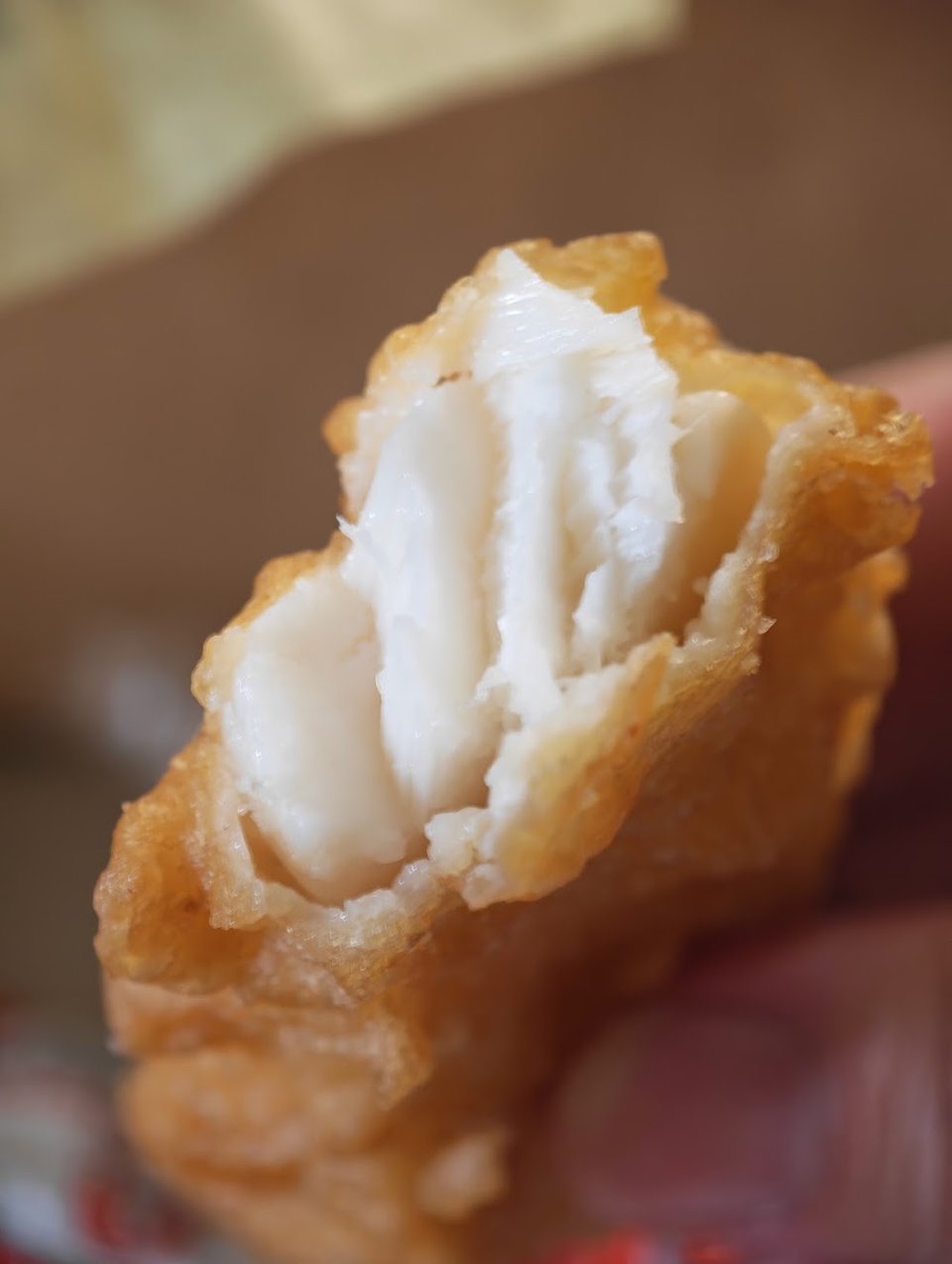 Printed menu with fried fish and side orders.