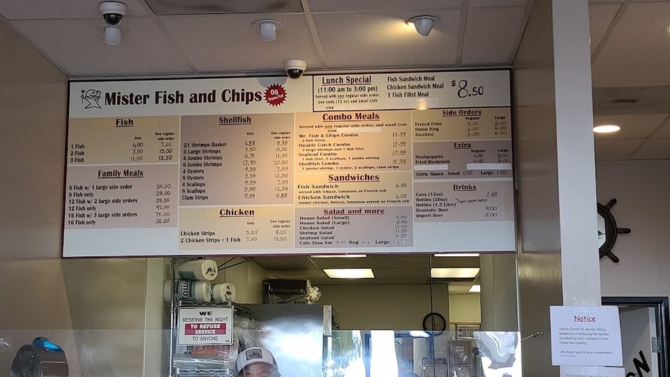 Takeaway menu showing fries, chips, and soda.